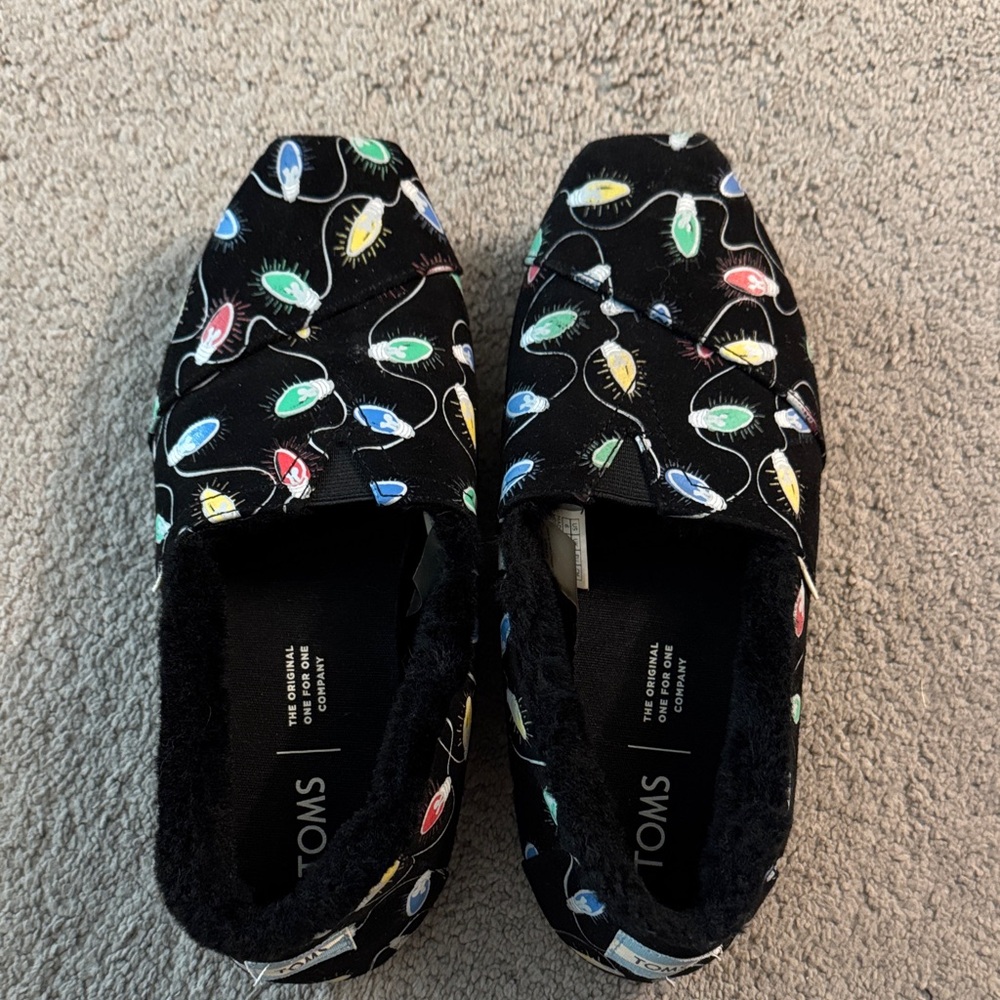 TOMS Festive Black Slip-Ons with Multicolor Light Design